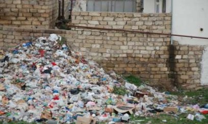 Bu küçə zibillik poliqonunu XATIRLADIR