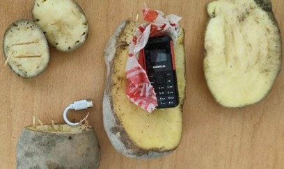 Kartofun içində telefon keçirmək istədilər 
