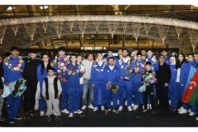 10-cu yeri tutan komandamız İslamiadadan Vətənə döndü - FOTO