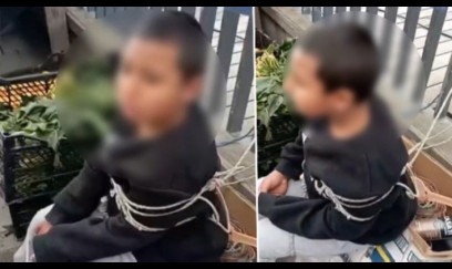 Oğurluq etdiyi deyilən 9 yaşlı uşağı iplə bağlayıb - VİDEOYA ÇƏKDİ