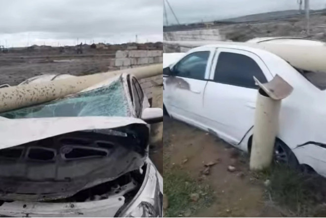 Bakıda minik avtomobili yol kənarındakı maneəyə çırpıldı 
