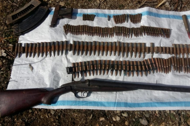 20 tüfəng, 8 mindən çox patron aşkarlandı 