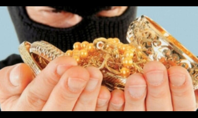 Evdən 29 min manatlıq qızıl oğurlayan şəxs saxlanıldı 