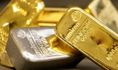 Qızılın qiyməti yenidən 5 000 dolları ötüb 