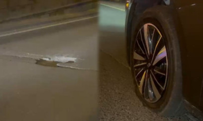 Prospektdəki bu çuxura düşən maşınların təkəri partlayır - VİDEO 