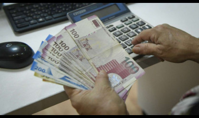 Saatlıq əmək haqqı: Yeni sistem cibimizə necə təsir edəcək?