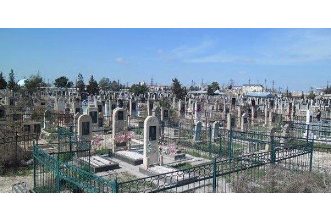 Tovuzda qadın ərinin məzarı başında öldü 