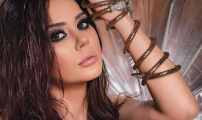 Oksana uşaqlıq fotosunu yaydı