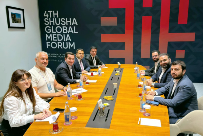 Hikmət Hacıyev Suriyanın informasiya naziri ilə görüşdü